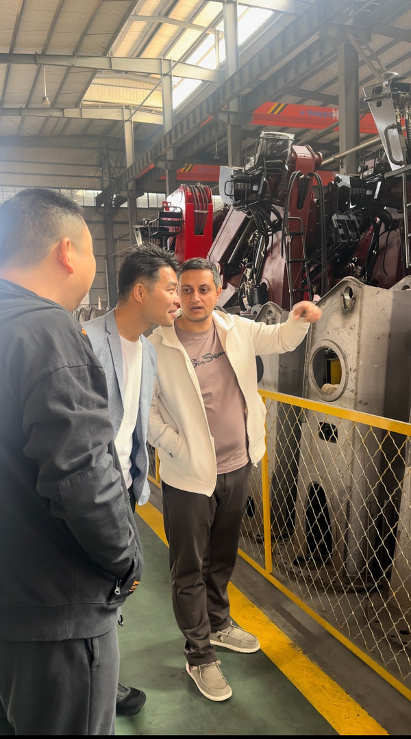 Our Team Guides International Clients Through Shenbai's Crane Workshop